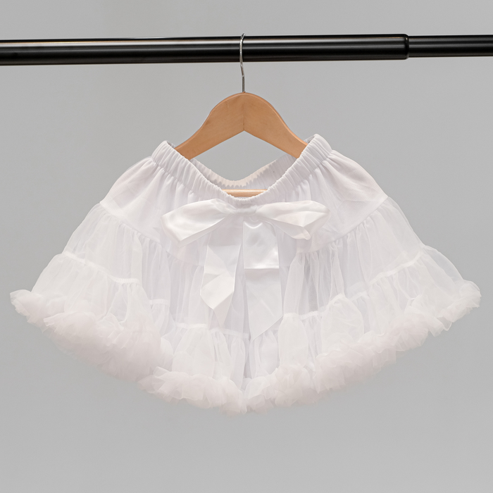 Tutu SkirtLayered tutu skirt with bow.
 
Size Guide: Small - 2 to 4 years Medium - 4 to 6 years Large - 6 to 8 years Tutu Skirt