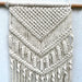 Macrame Wall Hanging DécorHandmade macramé wall hanging.
Size: Macrame 14" Width X 29" Length (from top to the ends of longest fringe)
Wood dowel: 17"Macrame Wall Hanging